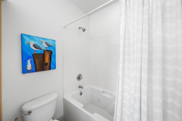 bathroom with toilet and shower / tub combo with curtain