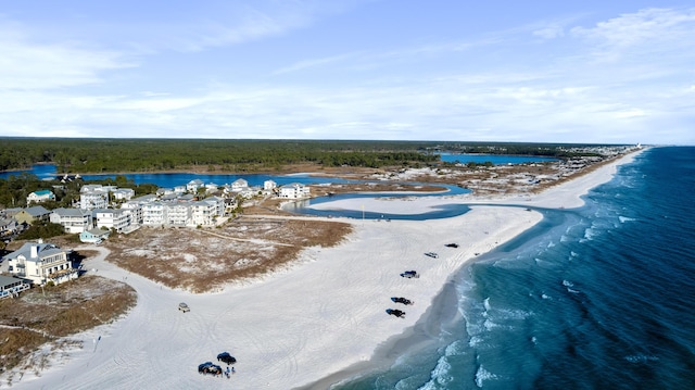 bird's eye view with a view of the beach and a water view