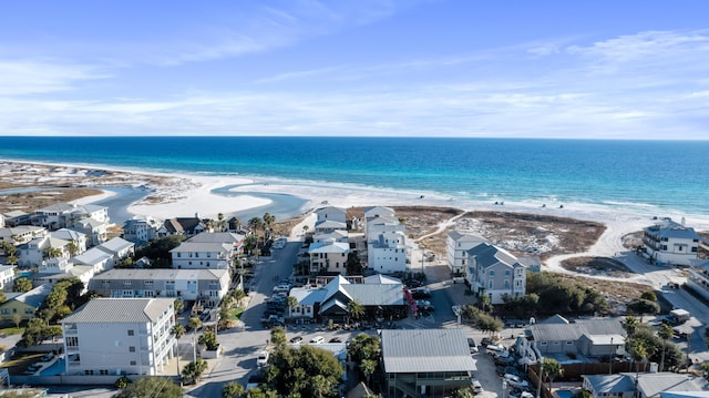 bird's eye view with a beach view and a water view