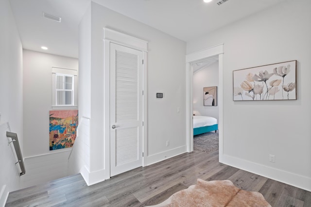 hall featuring light hardwood / wood-style floors