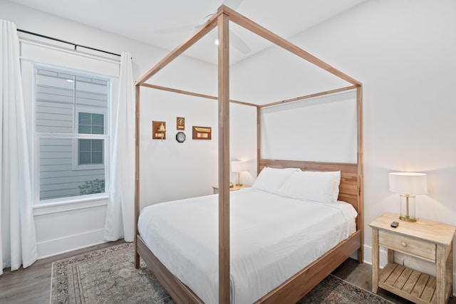 bedroom featuring dark wood-type flooring