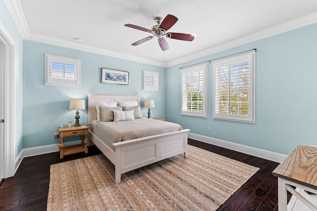 bedroom featuring dark hardwood / wood-style flooring, ceiling fan, and ornamental molding