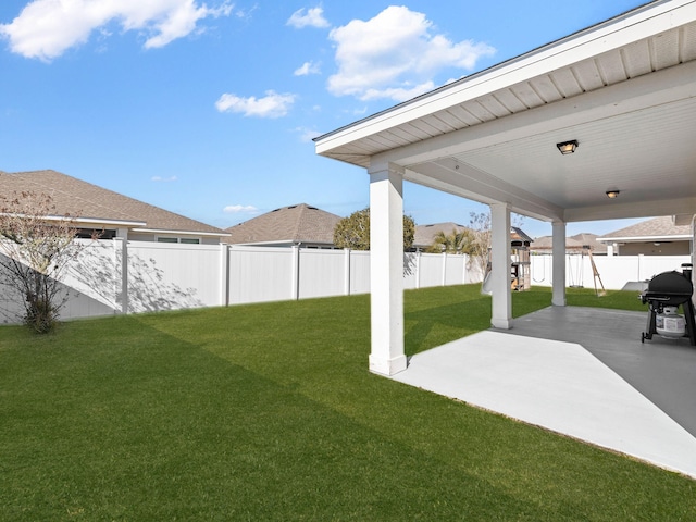 view of yard with a patio area