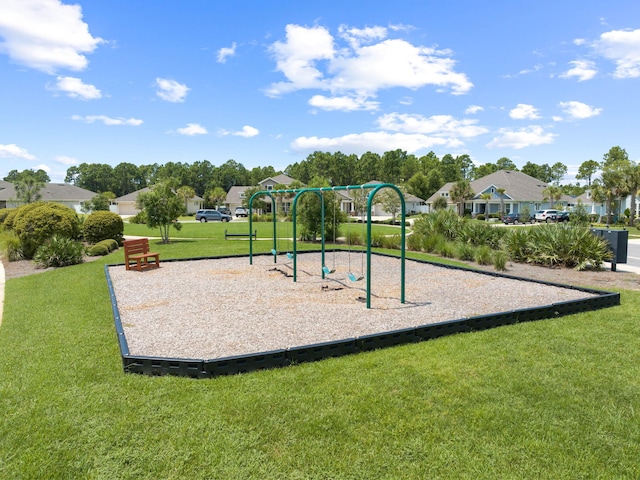 view of play area featuring a lawn