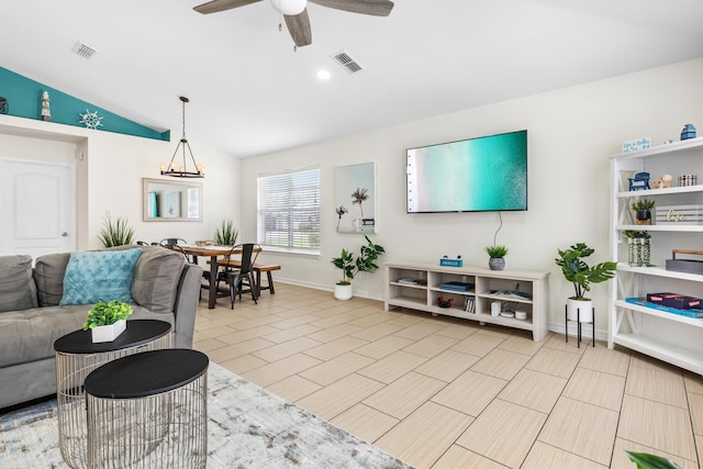 living room featuring ceiling fan and vaulted ceiling