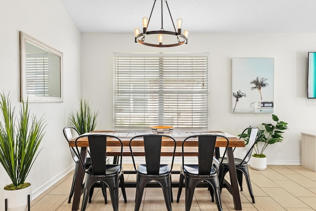 dining room featuring a notable chandelier