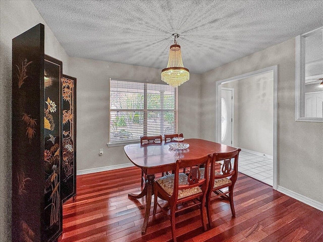 dining room with wood-type flooring