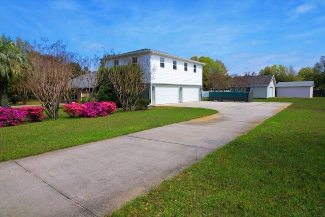 view of property exterior featuring a garage and a yard