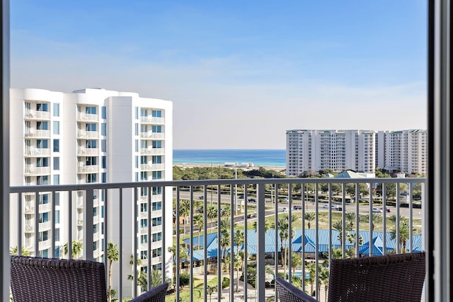 balcony featuring a water view