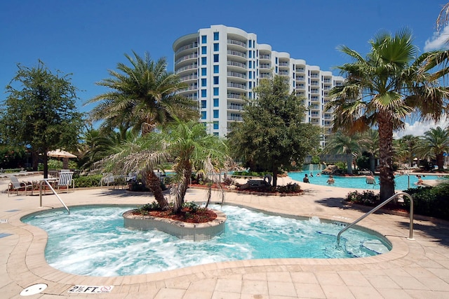 view of swimming pool featuring a patio area