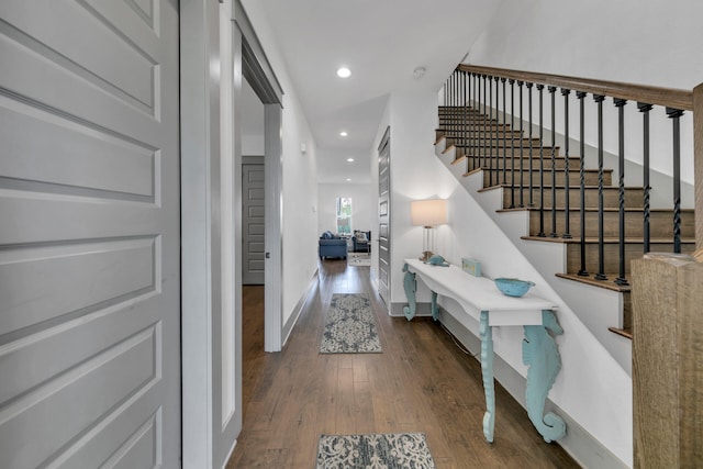 entryway with dark hardwood / wood-style floors