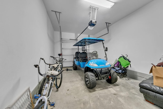 garage featuring a garage door opener