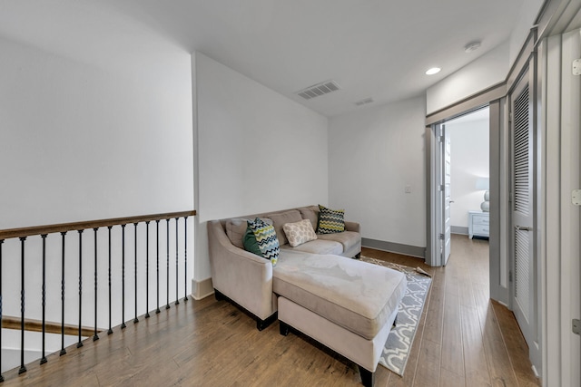 living area featuring hardwood / wood-style floors