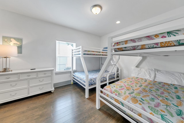 bedroom featuring dark wood-type flooring