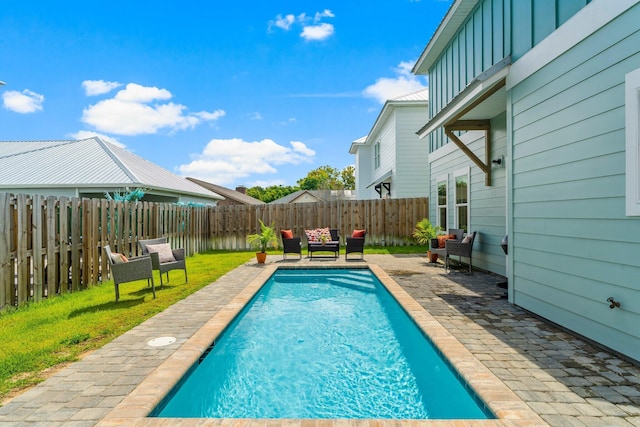 view of pool with a patio area