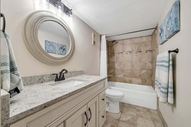 full bathroom featuring toilet, vanity, and shower / bath combo with shower curtain