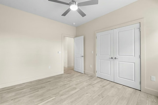 unfurnished bedroom featuring a closet, ceiling fan, and light hardwood / wood-style floors