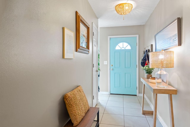 entryway featuring light tile patterned flooring