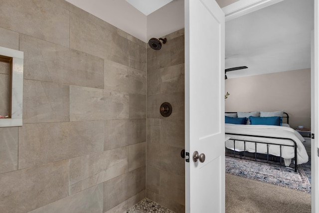 bathroom with tiled shower