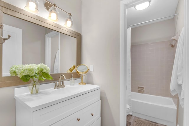 bathroom with vanity and shower / bath combo