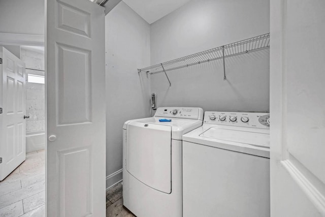 laundry area with washer and clothes dryer