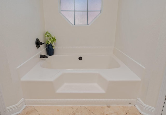 bathroom with a washtub