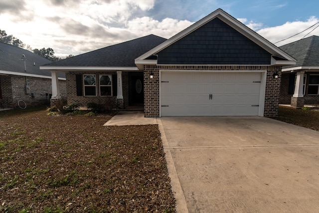 craftsman-style house featuring a garage