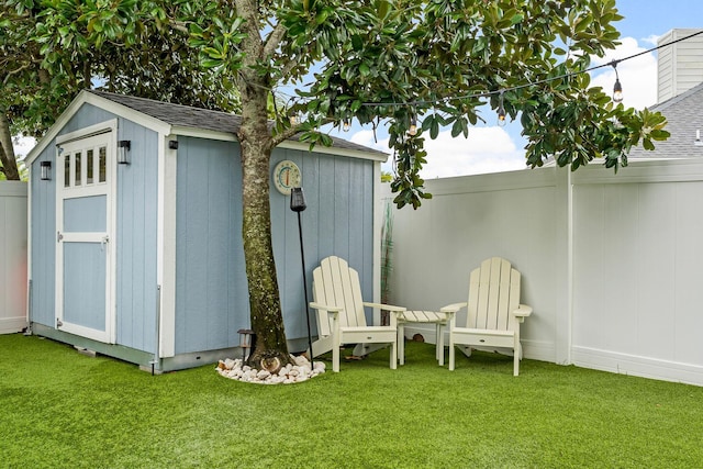 view of outdoor structure with a yard