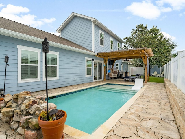 view of pool with a patio area and a pergola