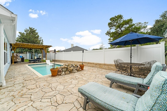 view of pool featuring a patio area and a pergola