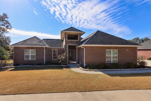 view of front facade with a front yard