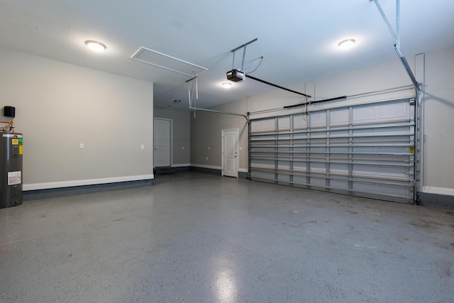 garage with a garage door opener and electric water heater