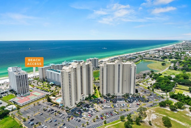 aerial view with a water view and a view of the beach