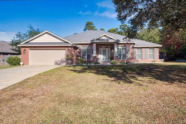 view of front facade with brick siding, driveway, an attached garage, and a front lawn