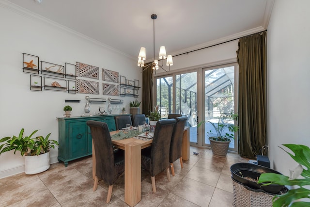 dining area featuring a notable chandelier, baseboards, light tile patterned floors, and ornamental molding