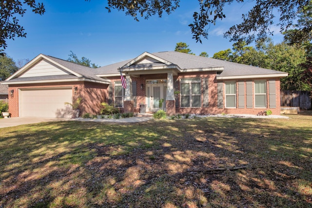 view of front facade with brick siding, an attached garage, concrete driveway, and a front yard