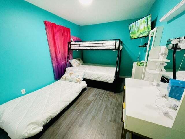 bedroom featuring hardwood / wood-style floors