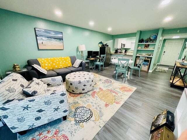 living room with wood-type flooring