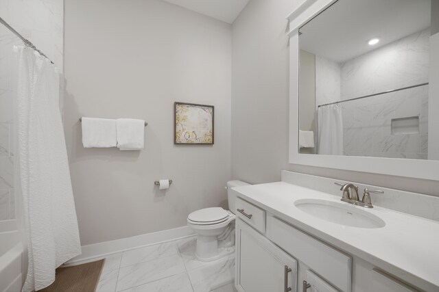 full bathroom with toilet, vanity, and shower / tub combo