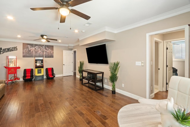 living room with crown molding and dark hardwood / wood-style floors