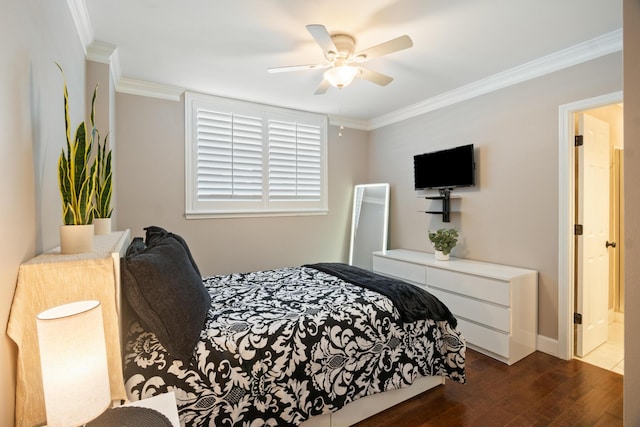 bedroom featuring dark wood-type flooring, ceiling fan, and crown molding