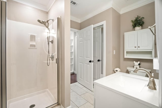 bathroom featuring a shower with door and ornamental molding