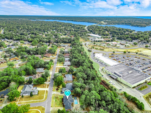 drone / aerial view featuring a water view