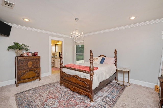 carpeted bedroom with ensuite bath, a chandelier, and ornamental molding