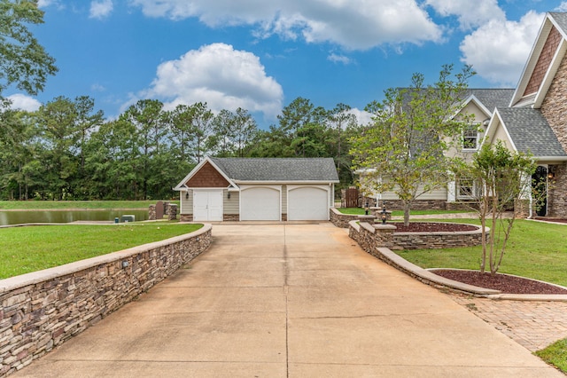 exterior space featuring a yard and a water view