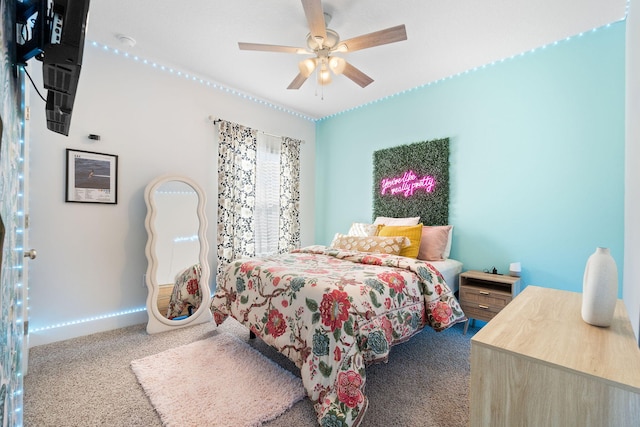 bedroom with ceiling fan and carpet flooring