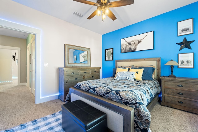 carpeted bedroom featuring ceiling fan