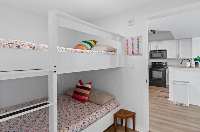 bedroom featuring light hardwood / wood-style floors