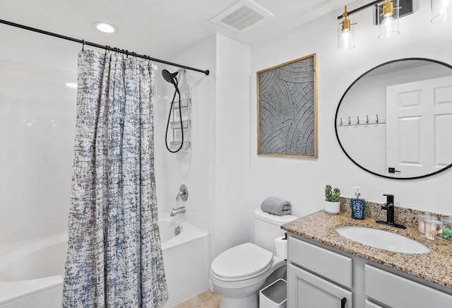 full bathroom featuring vanity, toilet, and shower / bath combo