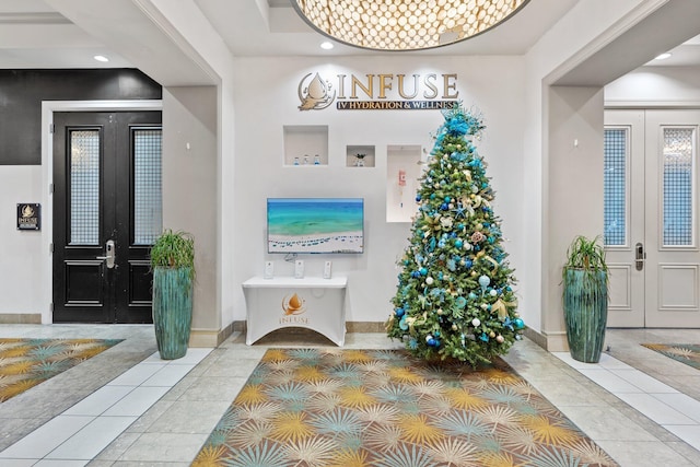 tiled entrance foyer with french doors